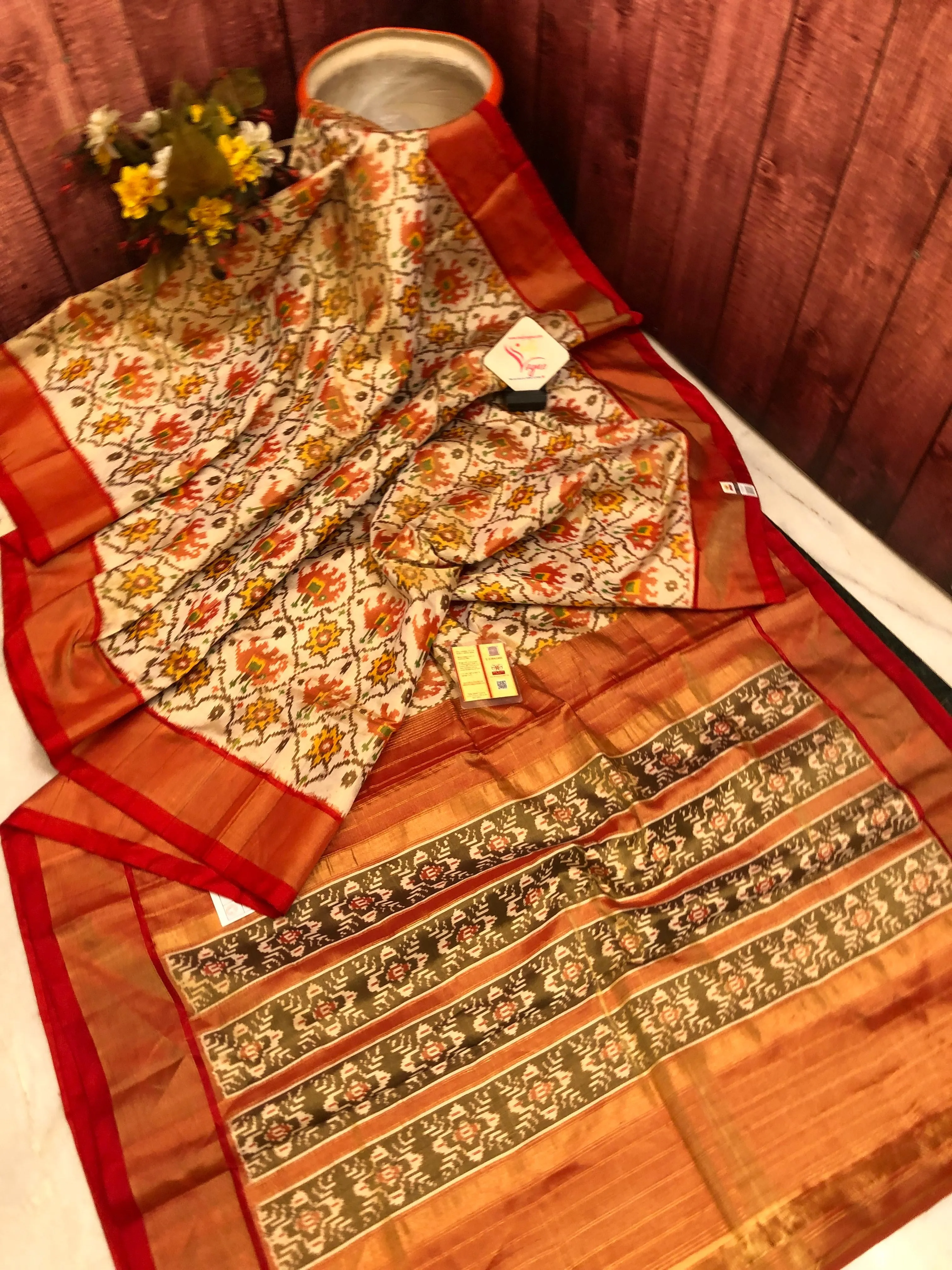 Cream and Red Color Pure Tissue Ikat Silk Saree with Allover Ikat Work